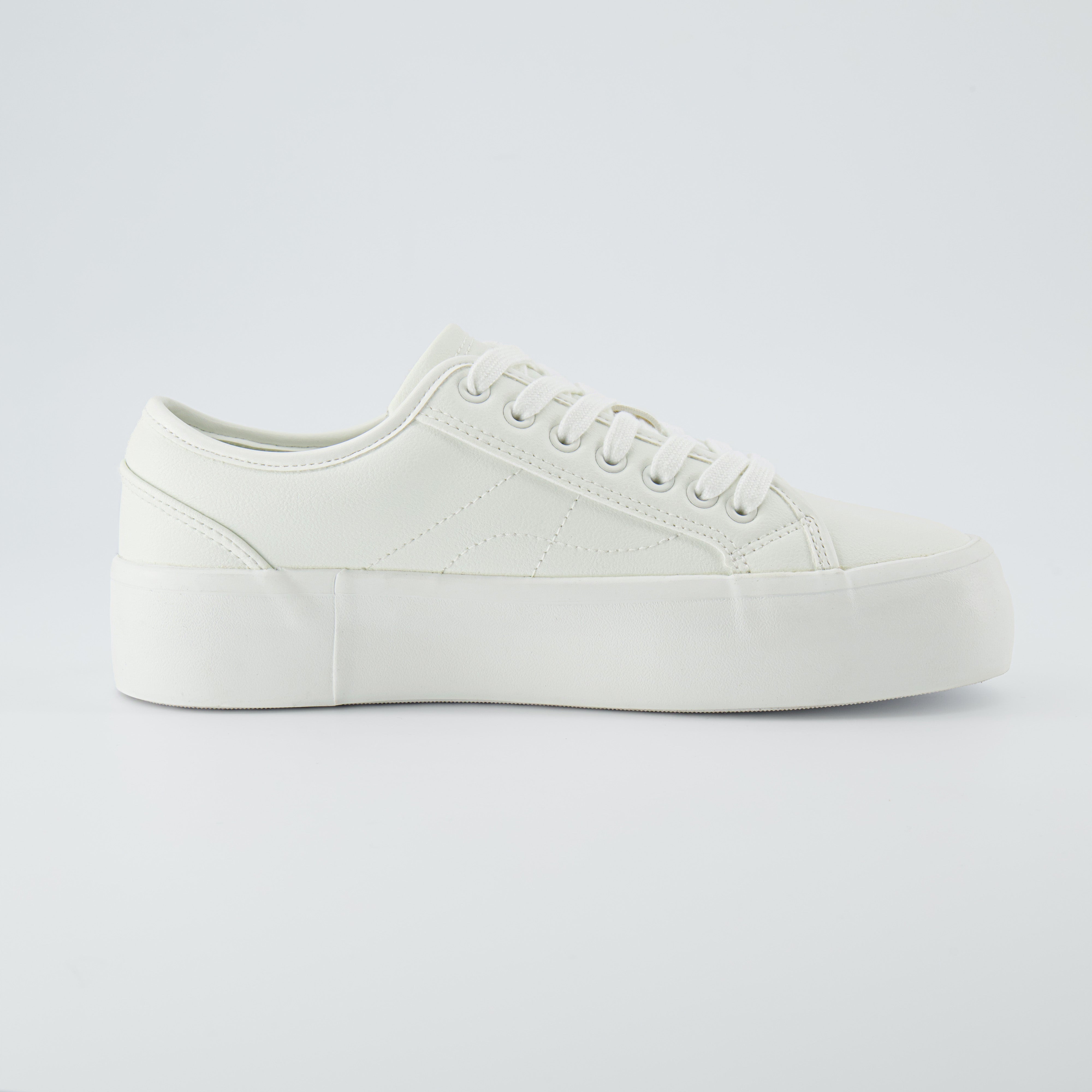 Tag Low Top Canvas Sneaker White Vegan Leather