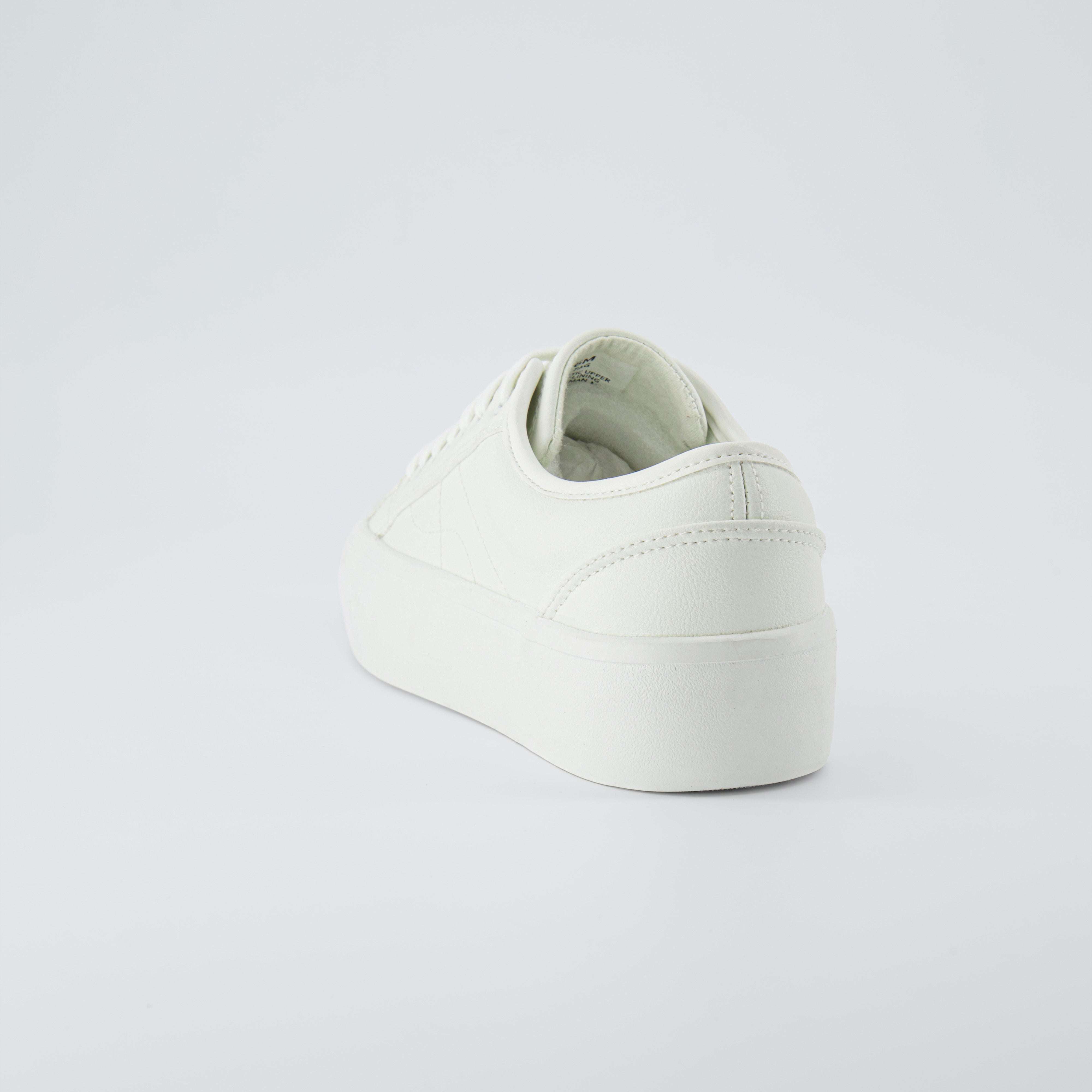 Tag Low Top Canvas Sneaker White Vegan Leather